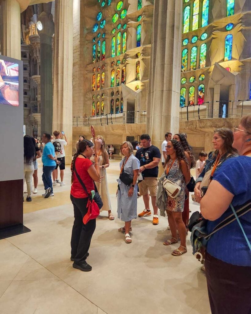 A woman gives a tour inside of Sagrada Família in Barcelona Spain (2)
