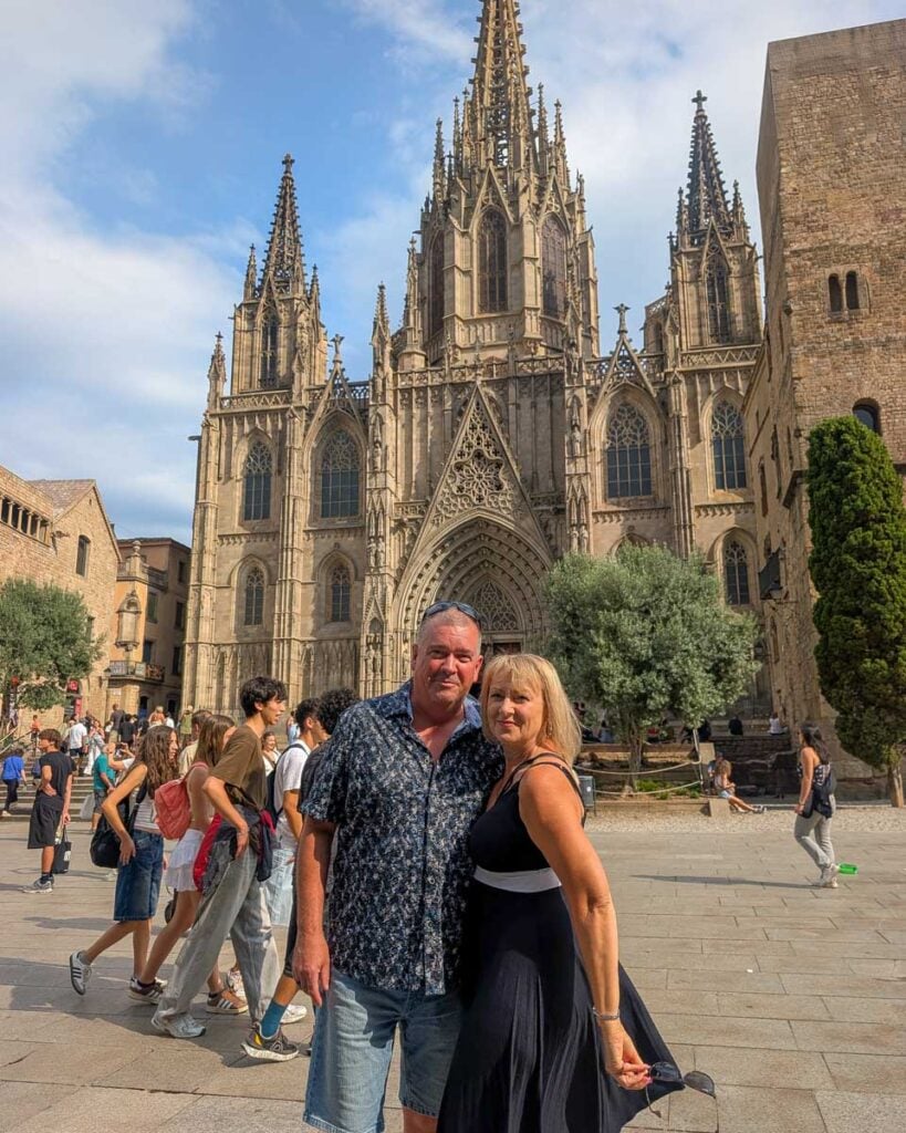 Two people at Barcelona Cathedral, also known as the Cathedral of the Holy Cross and Saint Eulalia, located in the Gothic Quarter of Barcelona, Spain