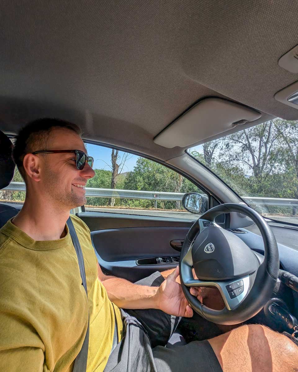 Daniel and Bailey driving a rental car in Europe (2)