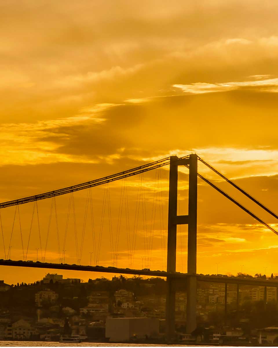 Bosphorus-Bridge-seen-at-sunset-on-a-cruise-in-Istanbul-Turkey