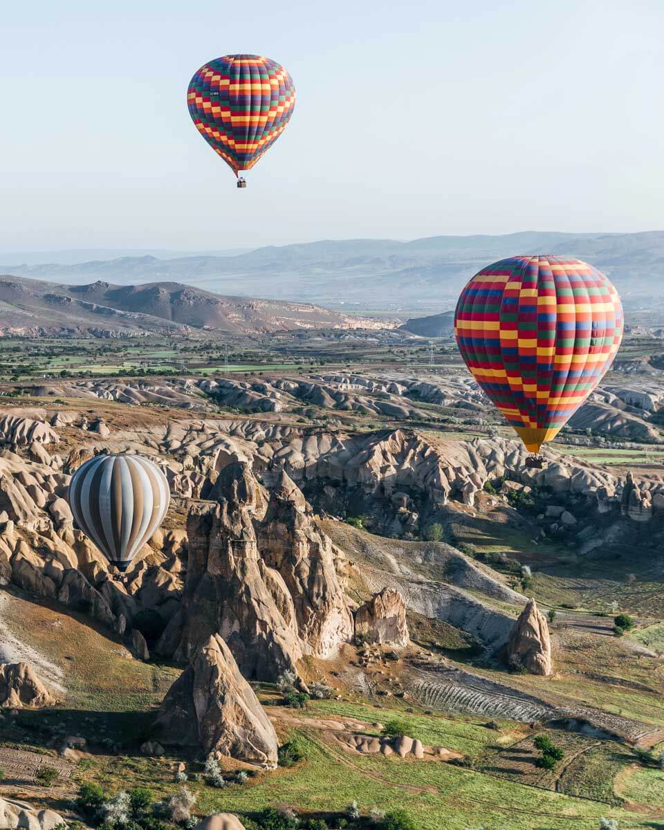 Hot-air-balloons-flying-over-Cappadocia-Turkey-near-Istanbul 1