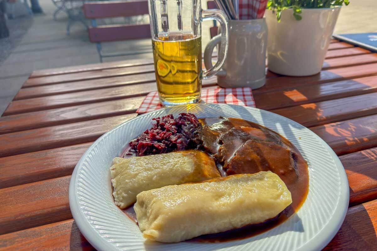 Sauerbraten eaten with dumplings and red cabbage in Germany