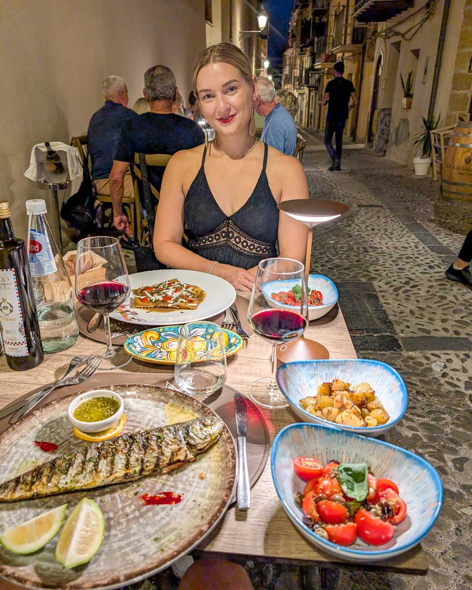 Bailey-eats-dinner-with-wine-in-Greece