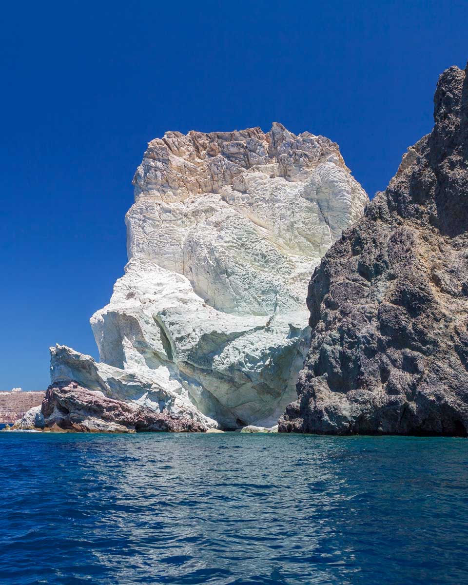 White rock cliffs seen on a cruise from Santorini Greece