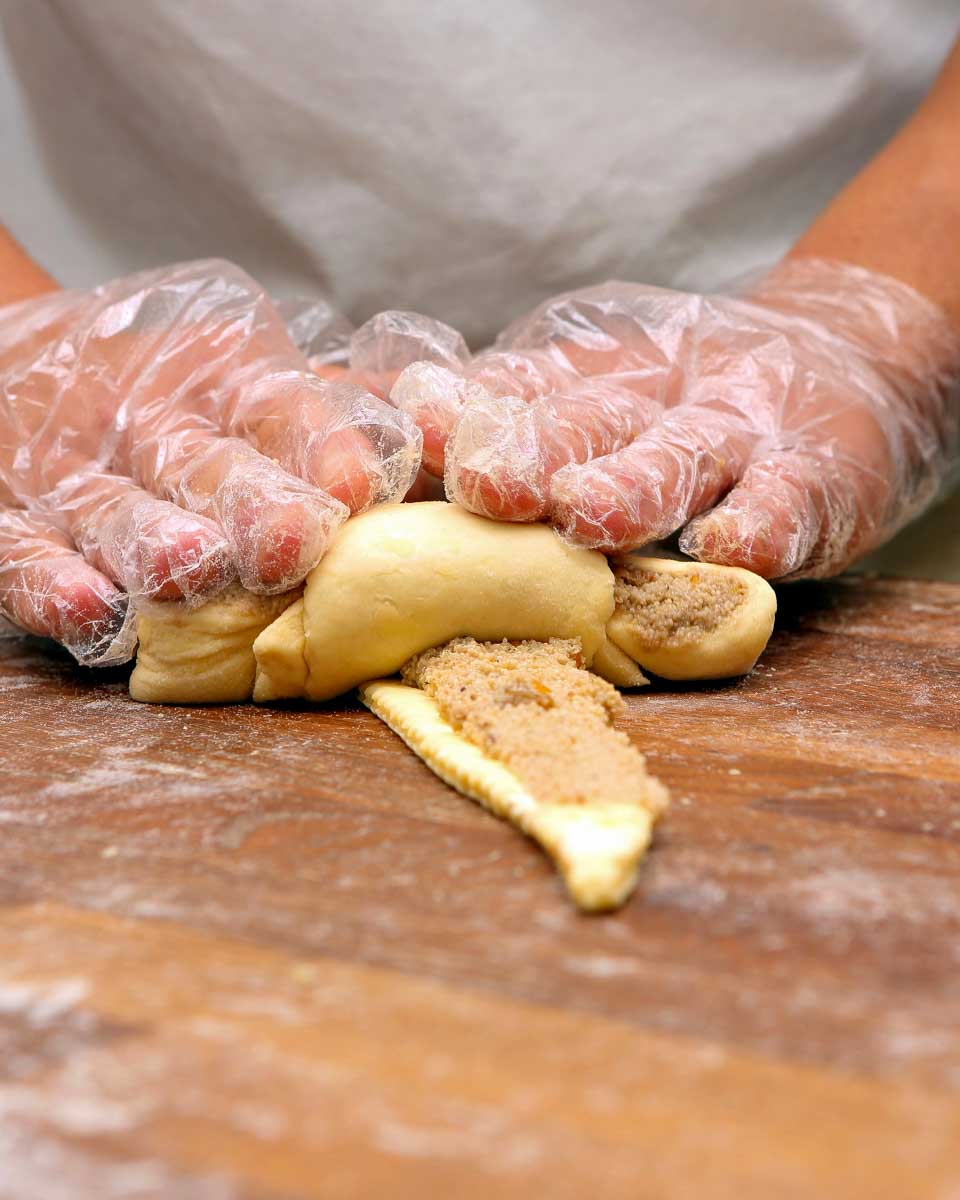 A-person-making-croissants-during-a-cooking-class-in-Paris-France