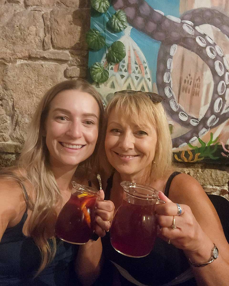 Bailey and mom drink sangaria in Malaga Spain