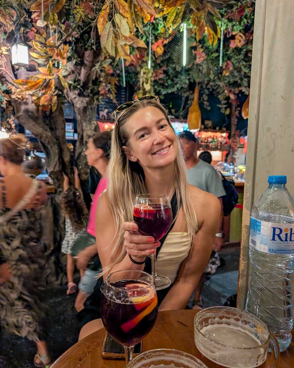 Bailey-holds-a-drink-cocktail-in-Malaga-Spain-1