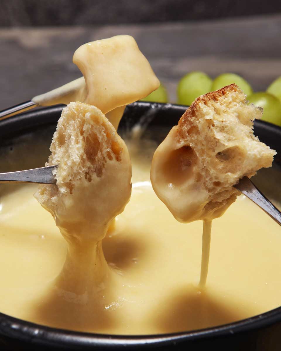 Fondue-being-eaten-on-a-tour-in-Zurich-Switzerland-1