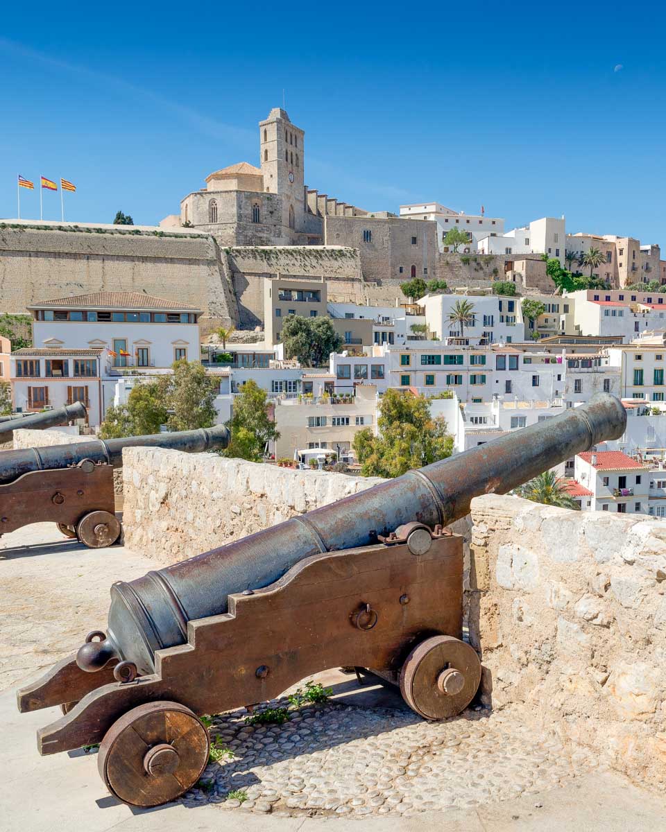 The Santa María Cathedral in Old Town Ibiza and cannons