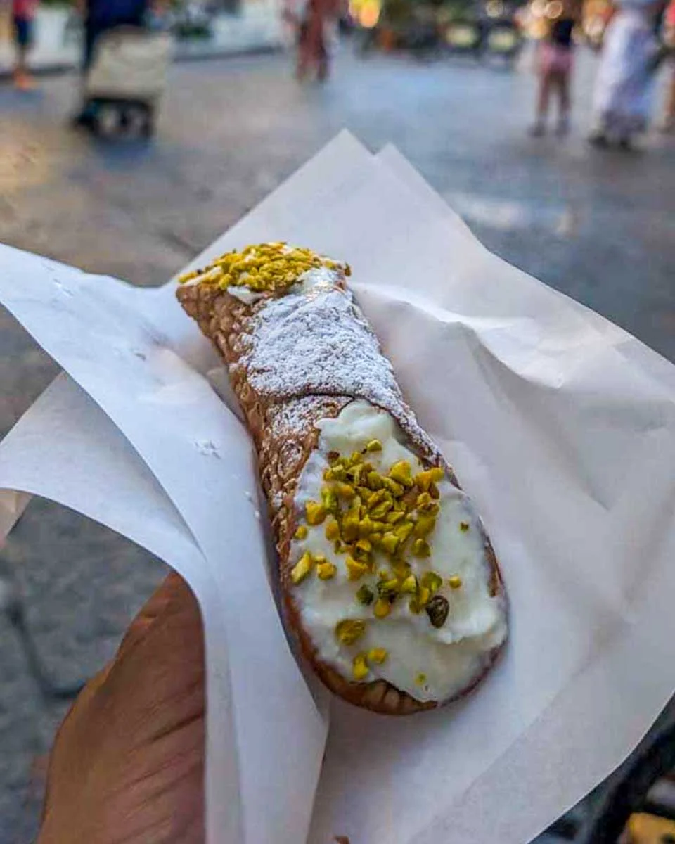 A-cannoli-eaten-for-breakfast-in-Taormina