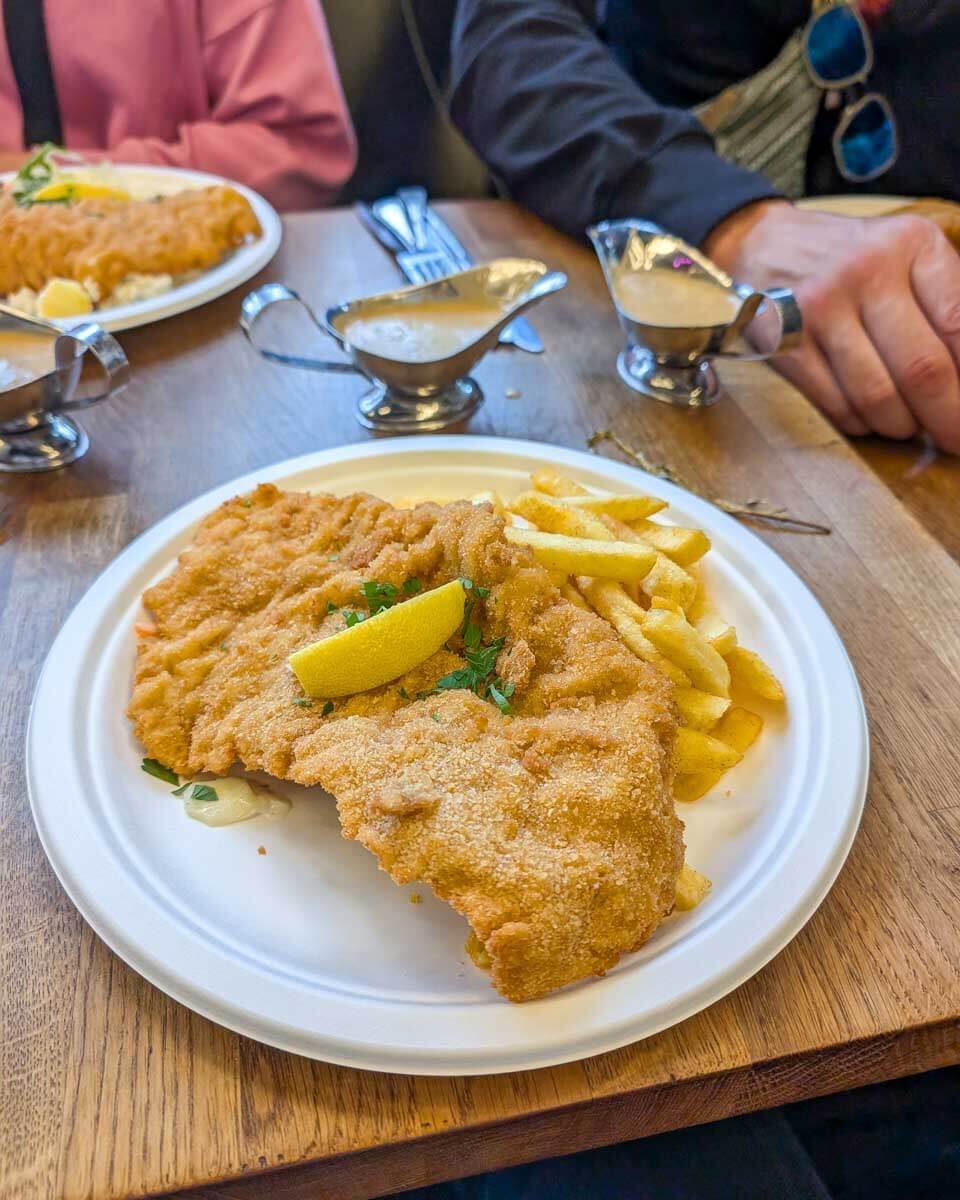 Bailey-eats-schnitzel-in-Frankfurt Germany 1