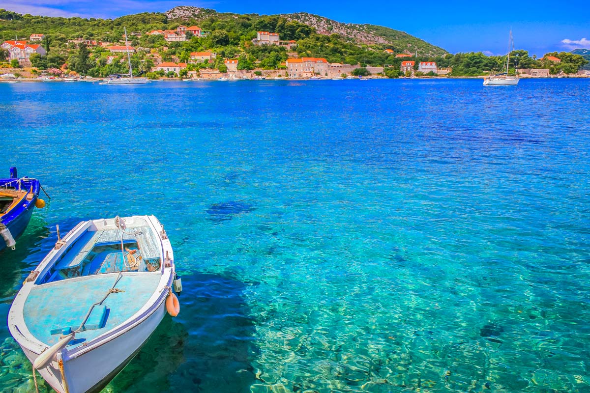 Blue water and a boat on the Elaphiti Islands Croatia