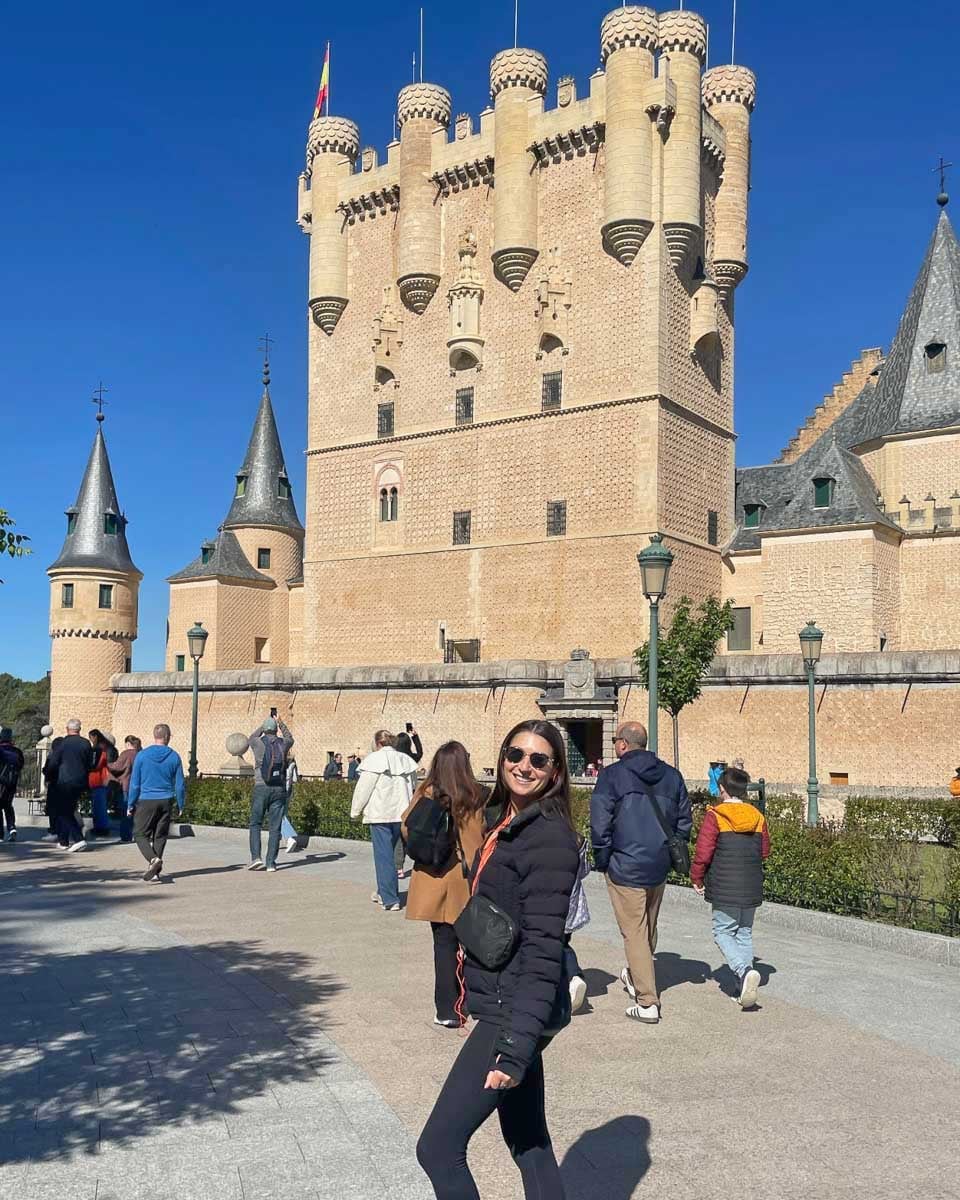 Brittni in front of the Alcázar of Segovia in Segovia