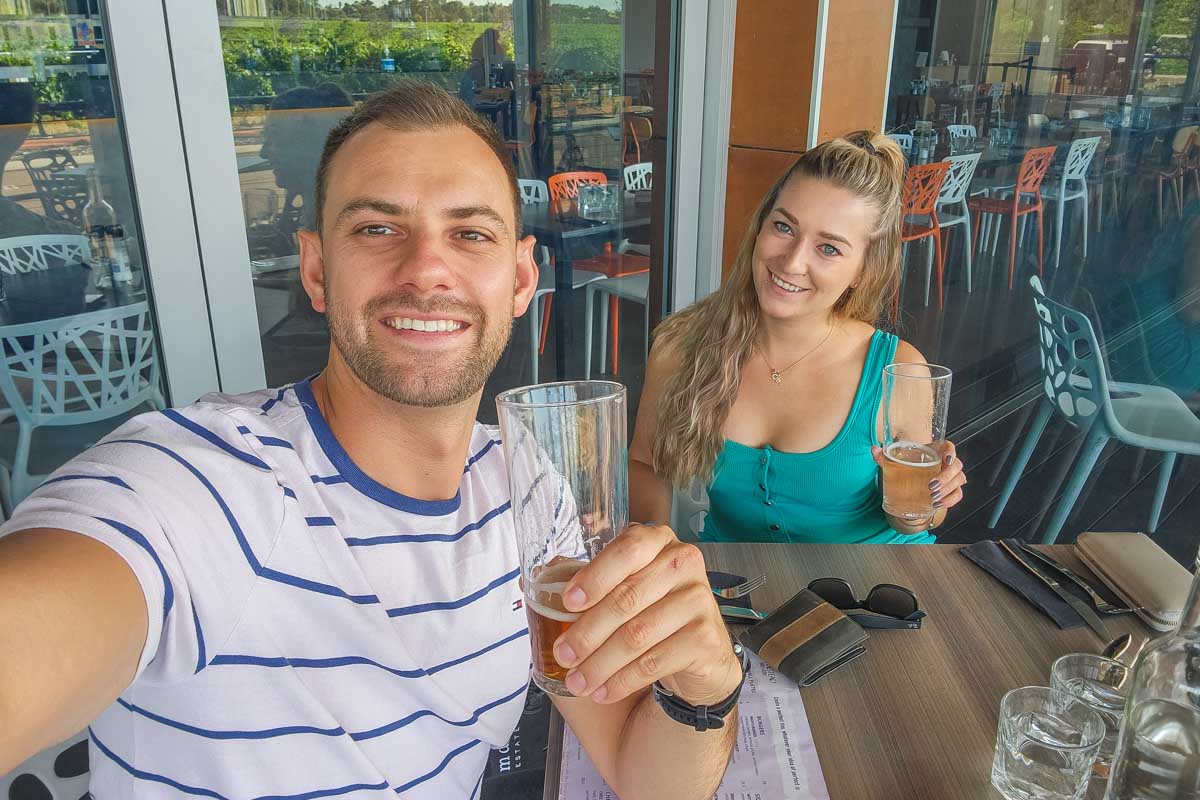 Daniel-and-Bailey-take-a-selfie-drinking-a-beer-in-Bruges-Belgium
