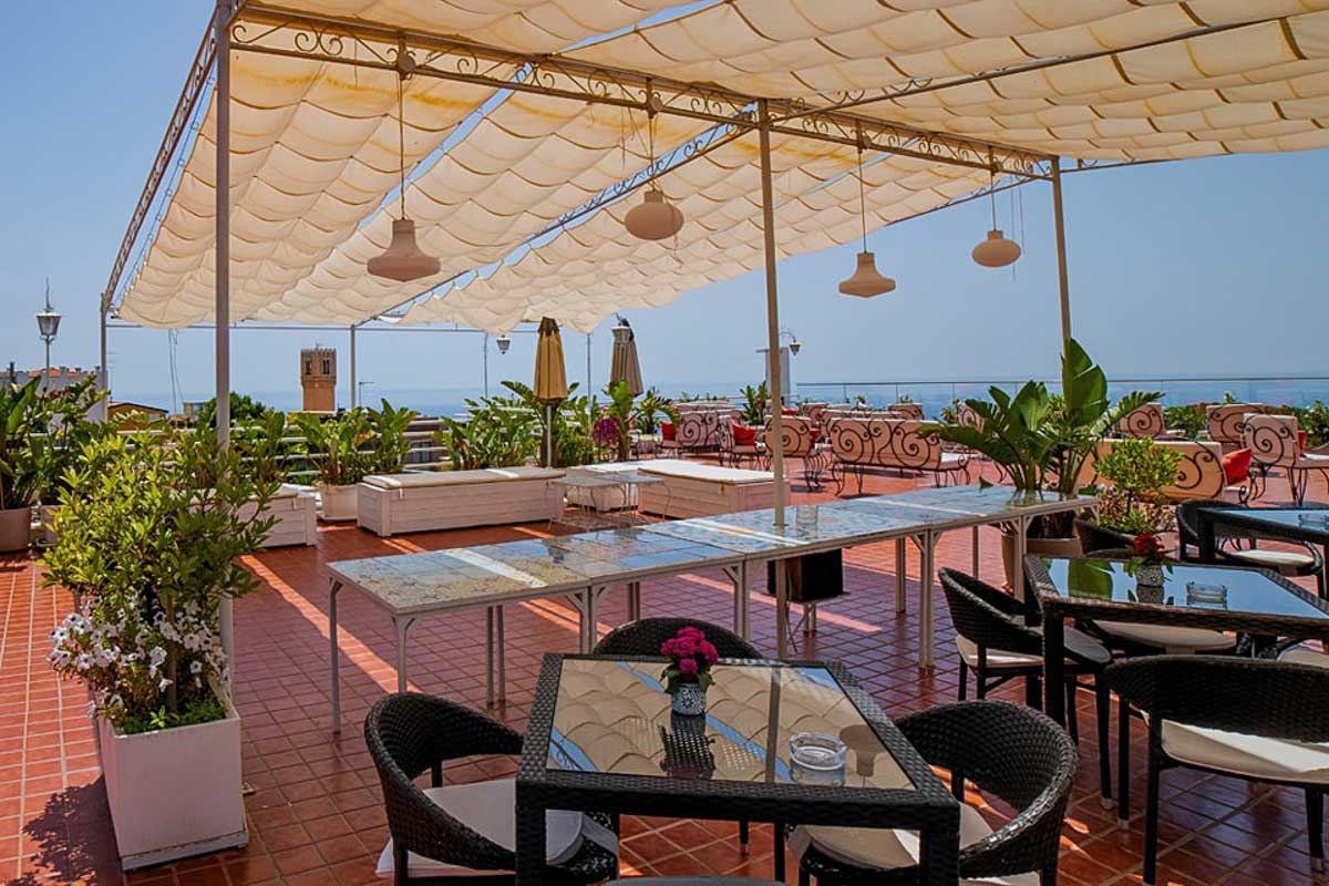 Tables on the terrace at Sky Rooftop Bar & Restaurant in Taormina