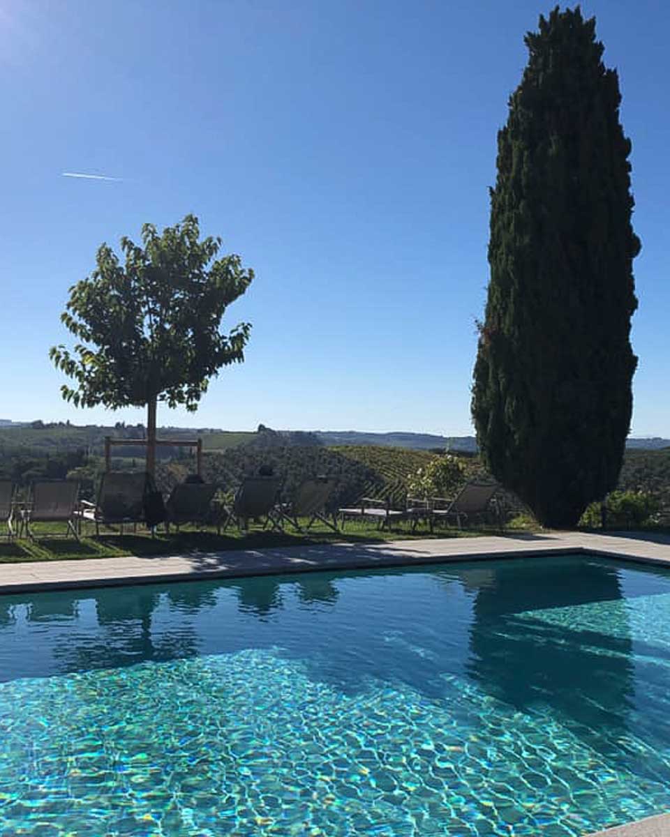 The outdoor pool area at Salvadonica in Tuscany