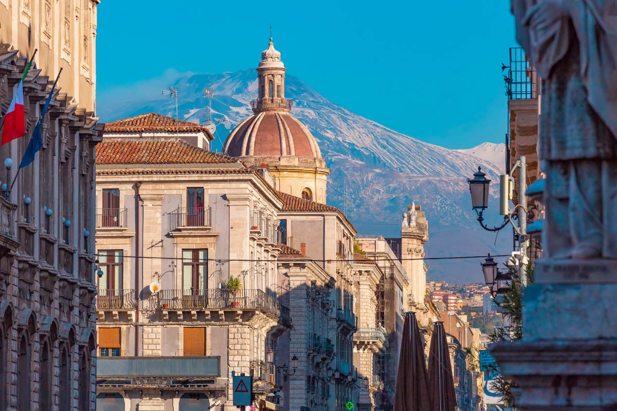 Via Etnea in Catania and mount Etna, Sicily, Italy