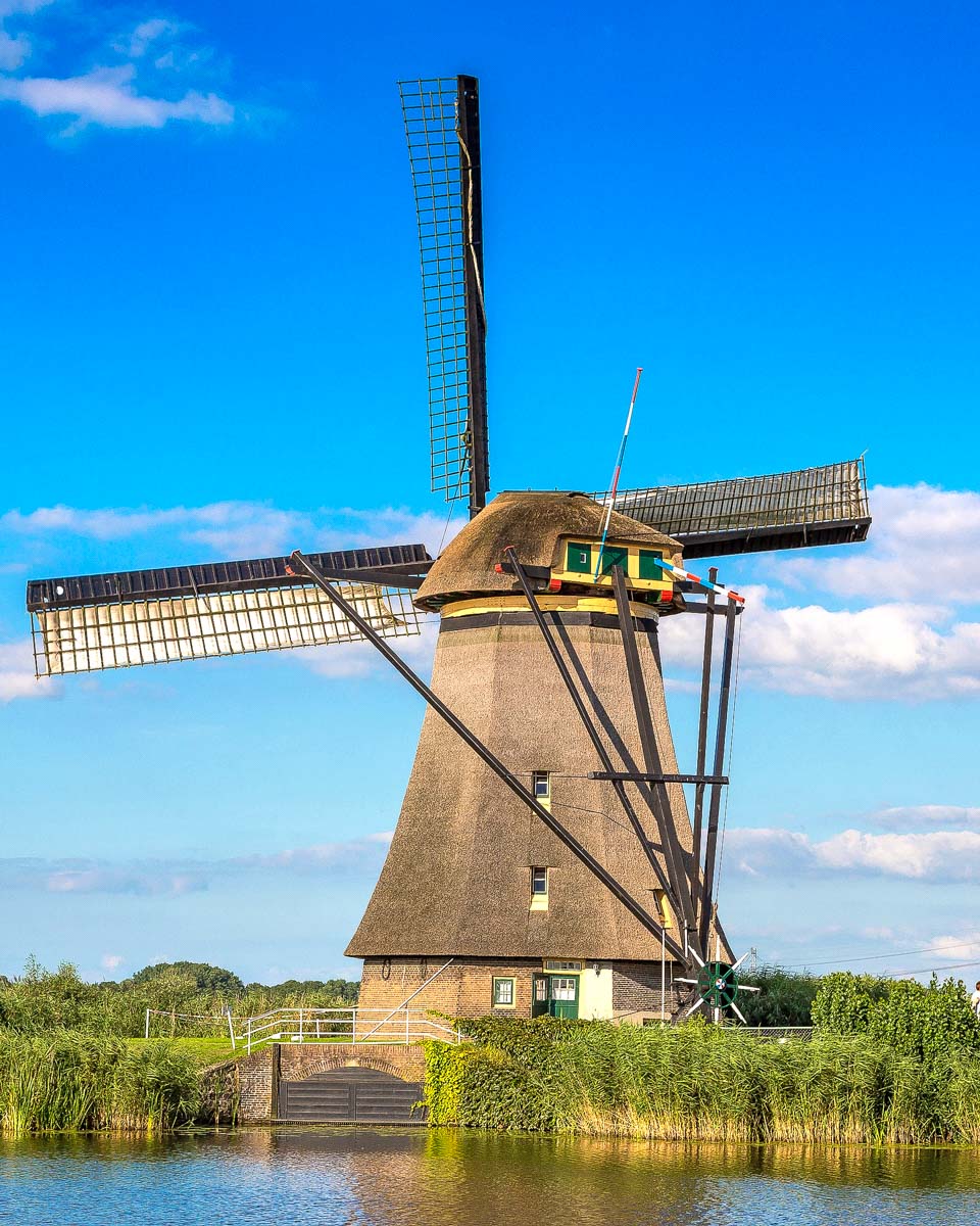 Windmill and canal in Kinderdijk Netherlands