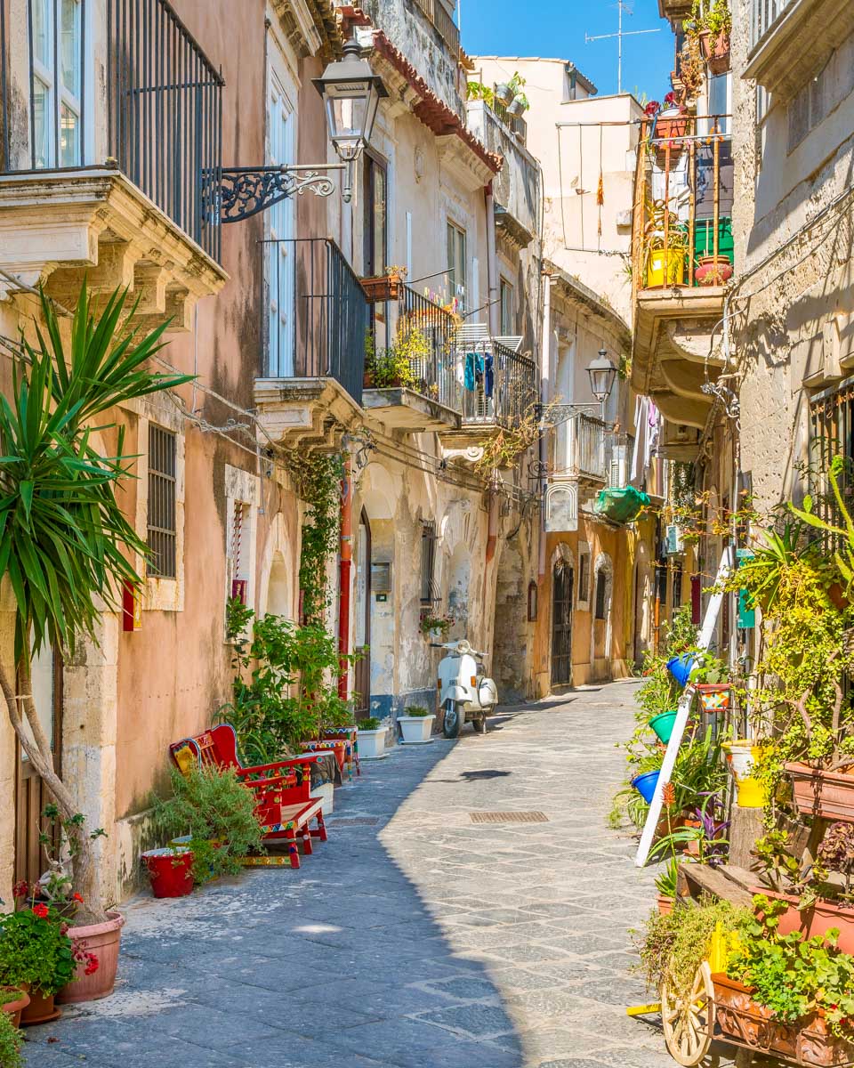 A narrow and picturesque road in Ortigia seen on a tour from Catania Sicily Italy