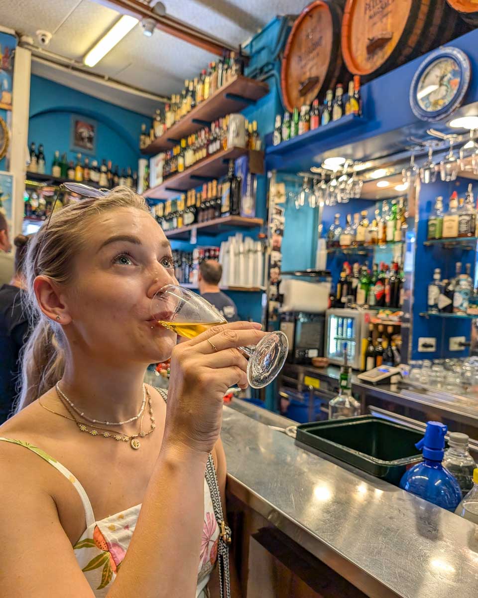 Bailey-drinks-wine-on-a-food-tour-in-Madeira-Portugal