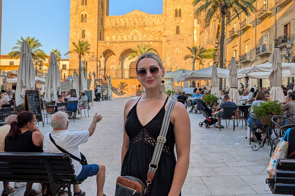 Bailey stands in Piazza Duomo Cefalu Italy
