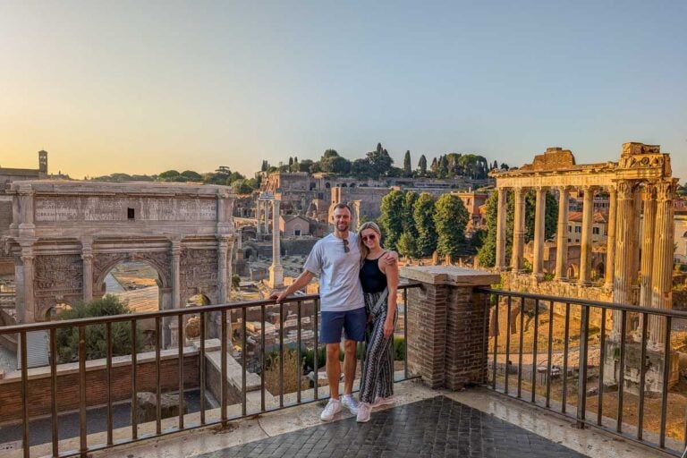 Daniel and Bailey smile at sunset in Rome Italy