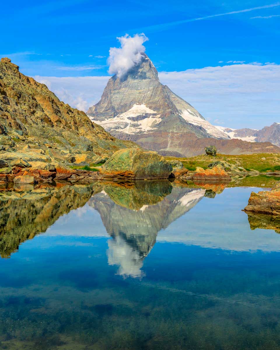 Matterhorn on Riffelsee Lake seen on a hike from Zermatt Switzerland