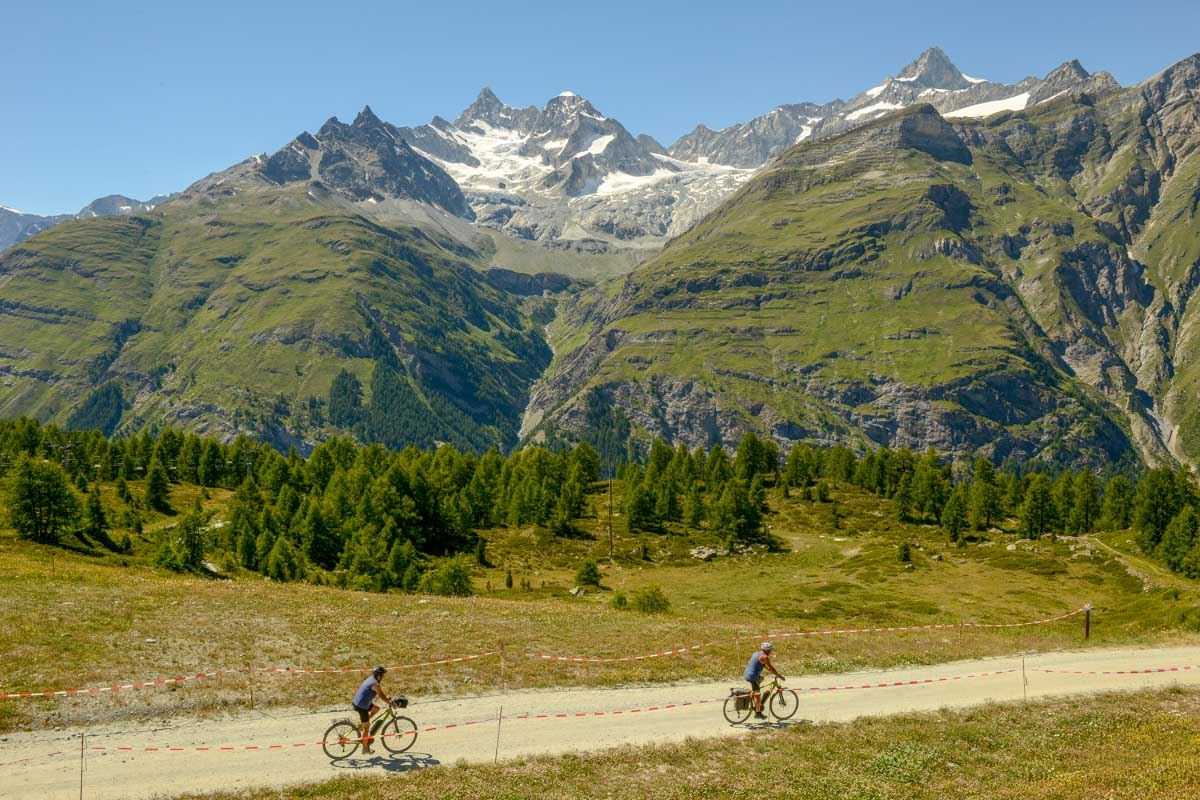 People mountain bike at Sunnegga near Zermatt Switzerland
