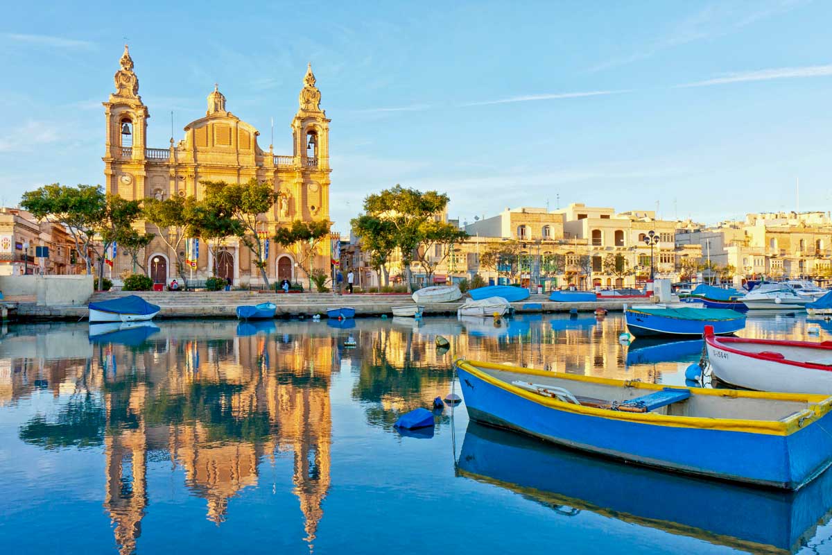 Silema and Stella Maris Church at golden hour in Malta