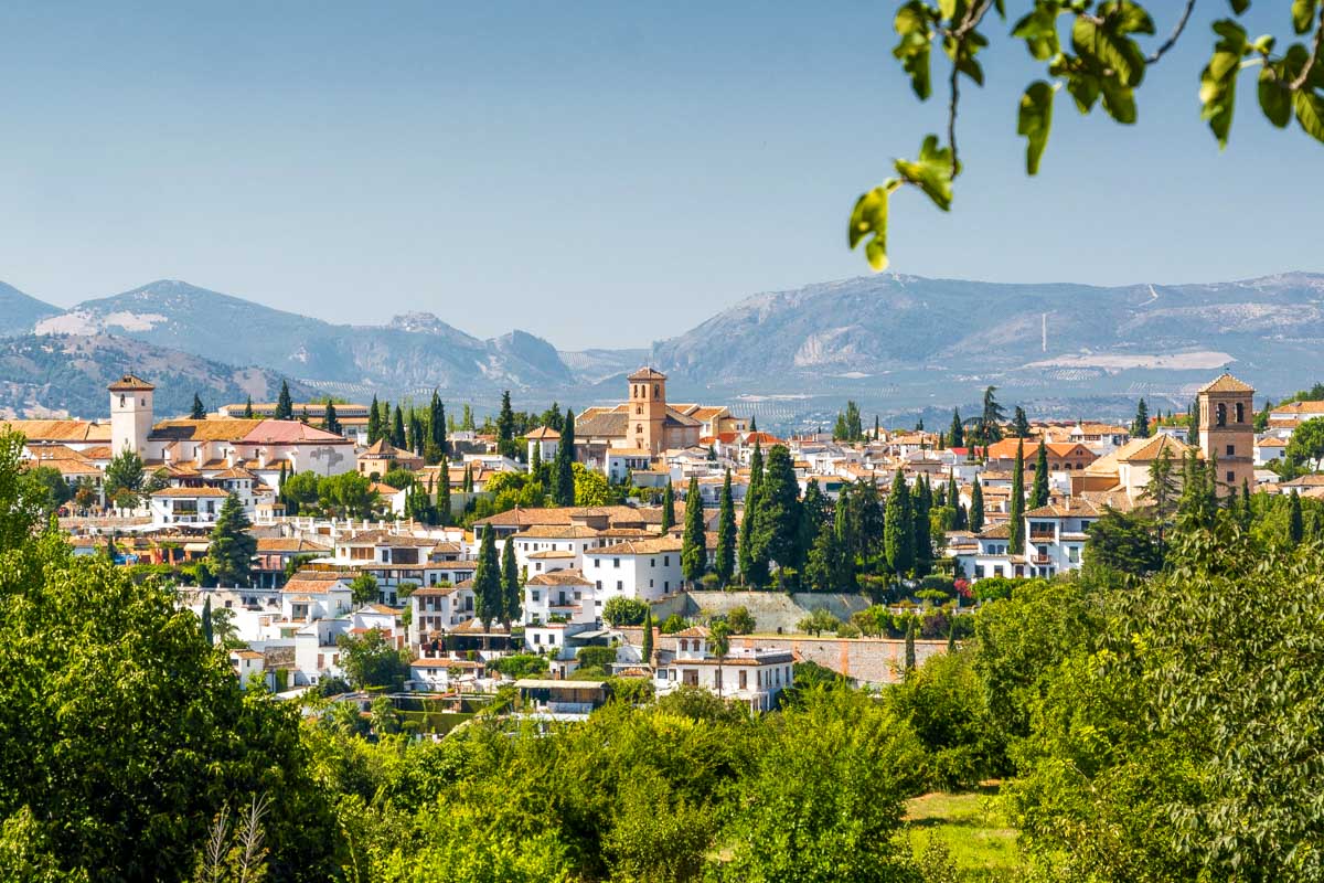 Sunny view of Granada from viewpoint of garden of Generalife Spain