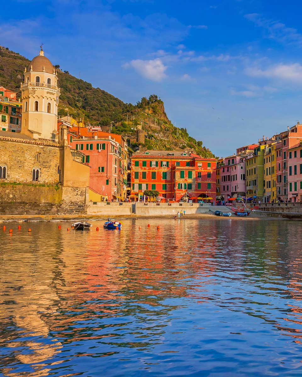 The-village-of-Vernazza-seen-on-a-sunset-cruise-of-Cinque-Terre-Italy