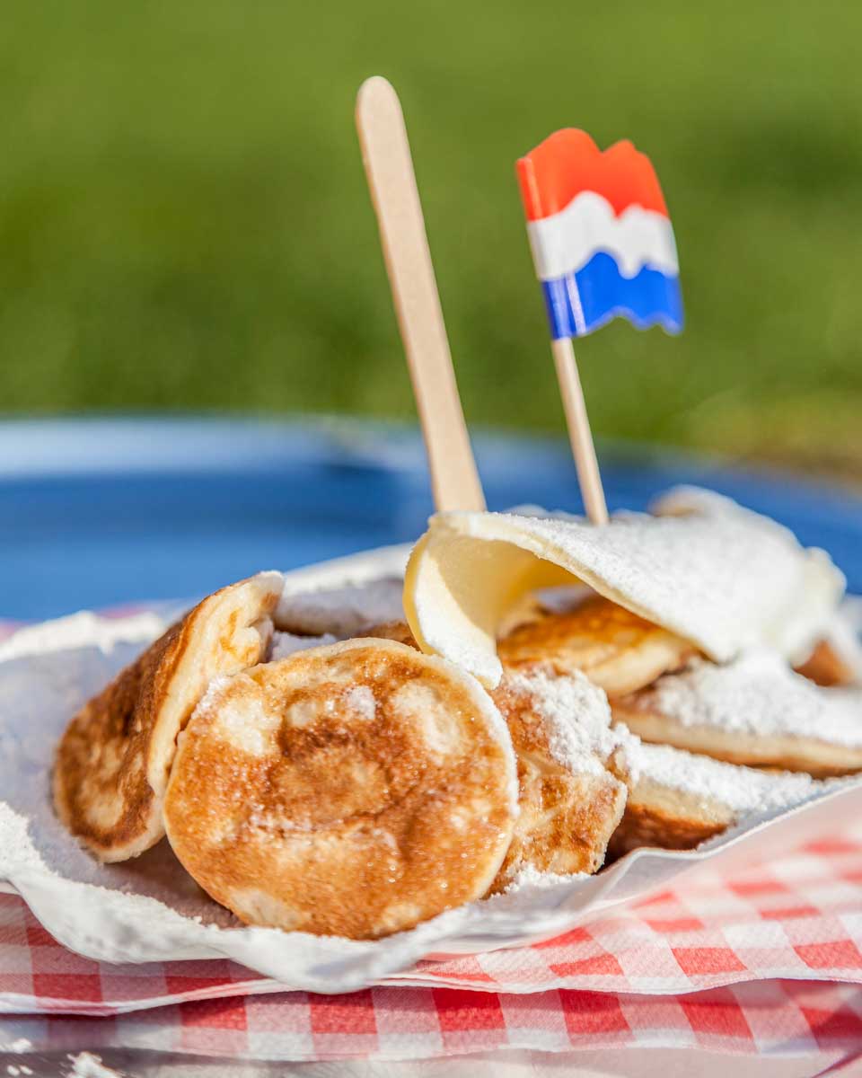 Traditional Dutch poffertjes eaten in Rotterdam, Netherlands