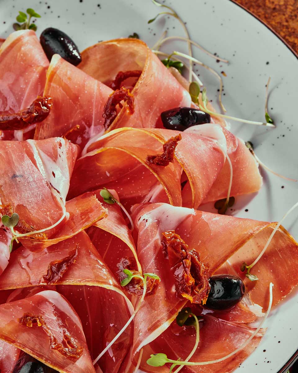 A-meat-plate-with-olives-eaten-on-a-food tour in Zadar Croatia