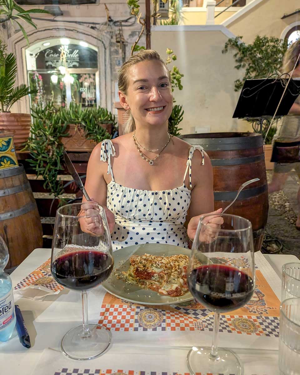 Bailey-eats-dinner-with-wine-in Zadar Croatia