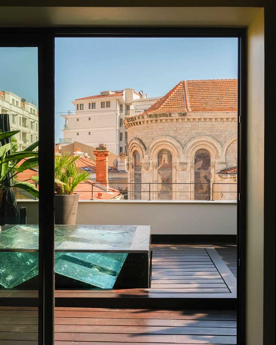 Balcony with pool and a city view at Five Seas by Inwood Hotels Cannes