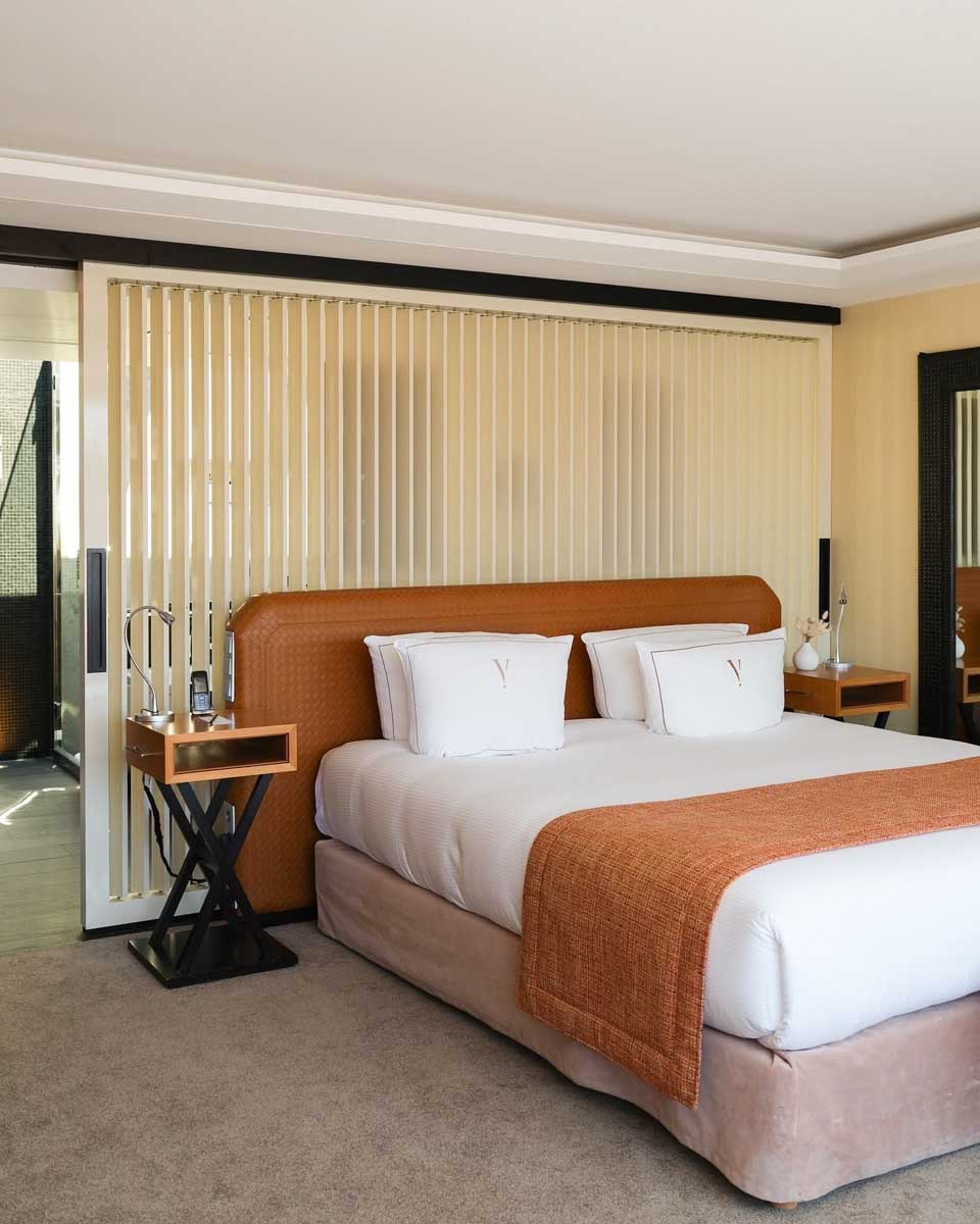 Bed in the hotel room at Five Seas by Inwood Hotels in Cannes