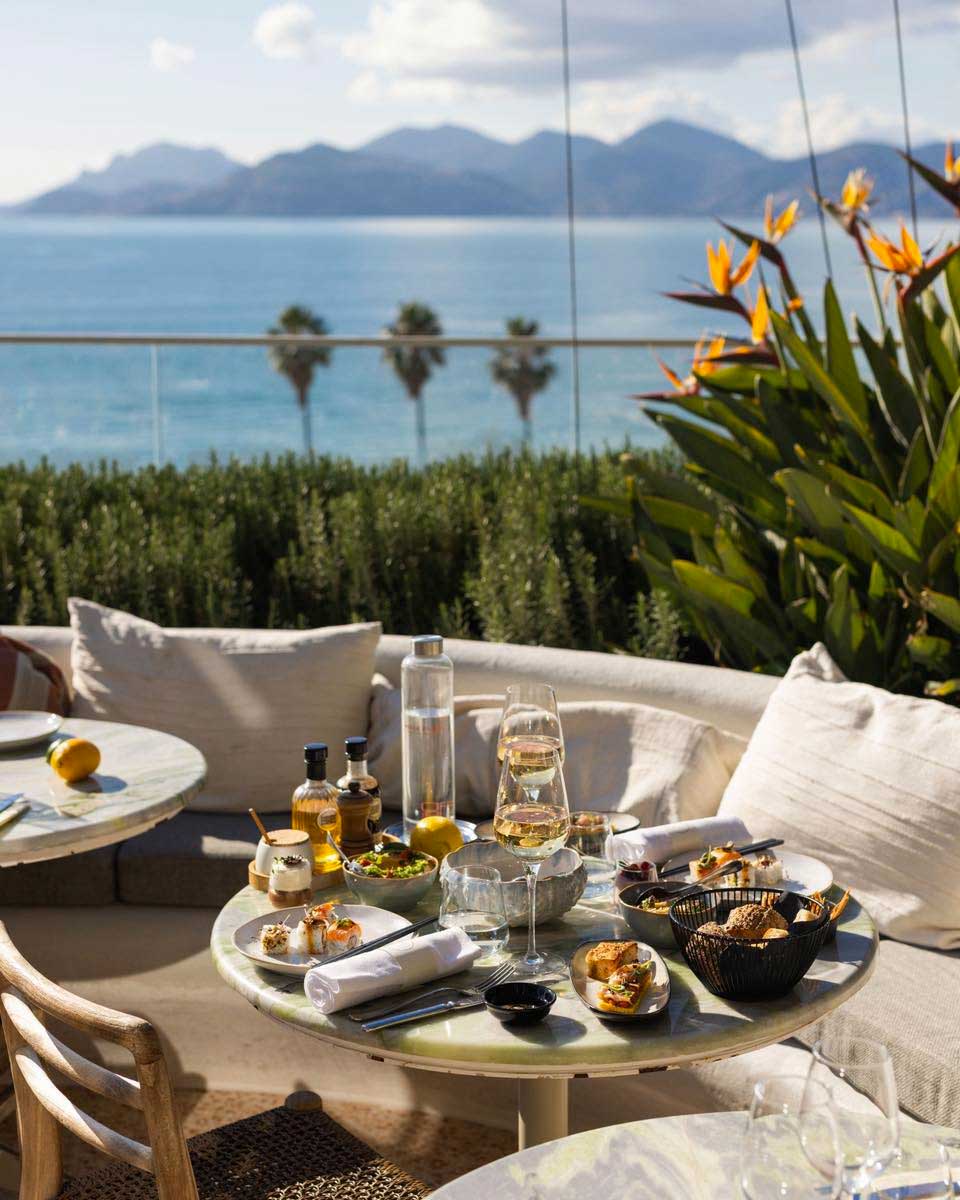 Dinner on a balcony with ocean view at Hôtel & Spa Belle Plage Cannes