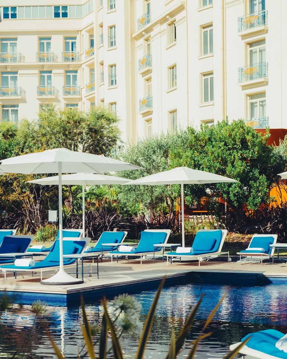 Outdoor pool area at Hôtel Martinez in Cannes